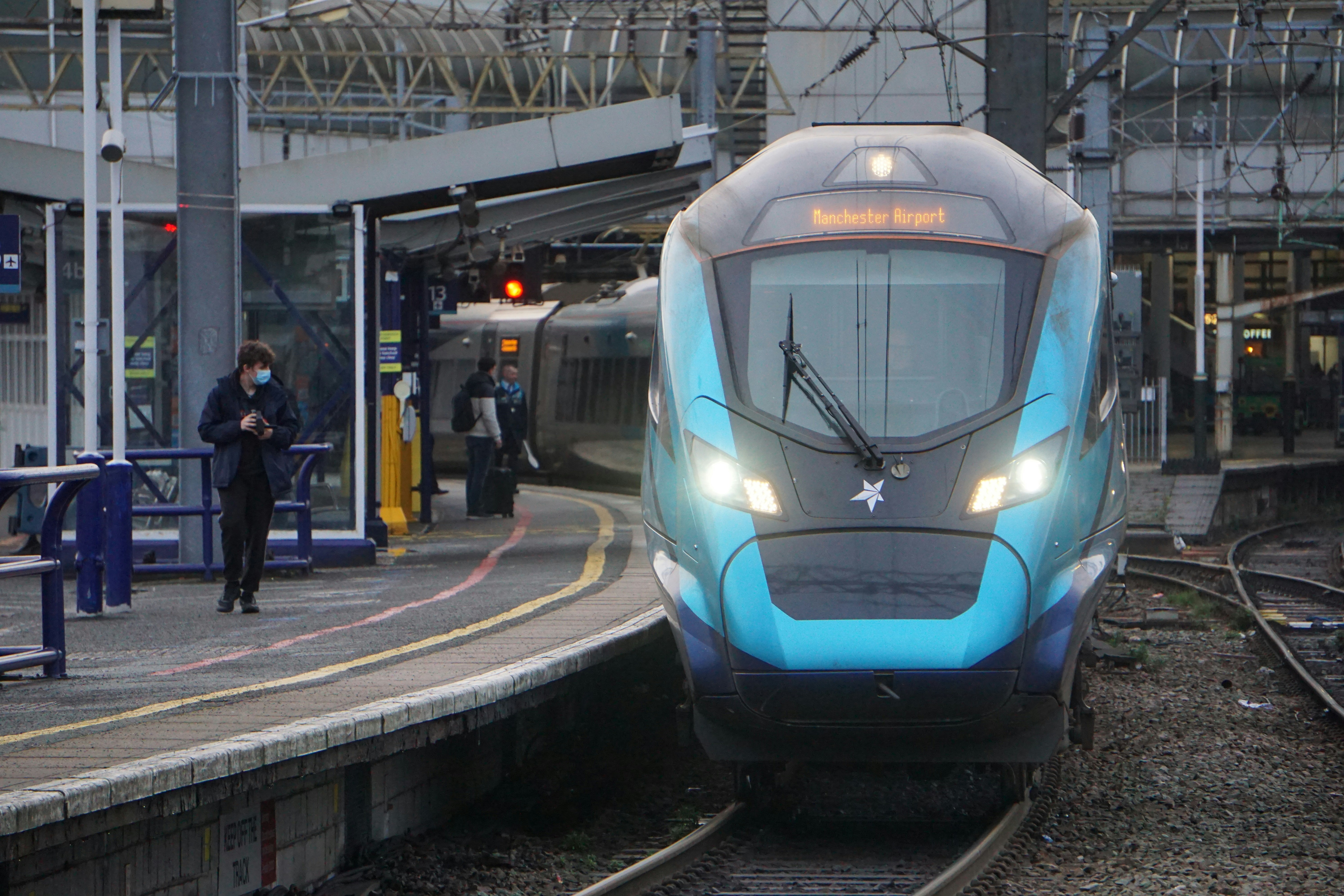 Transpennine Express train leaving Manchester Piccadilly train station